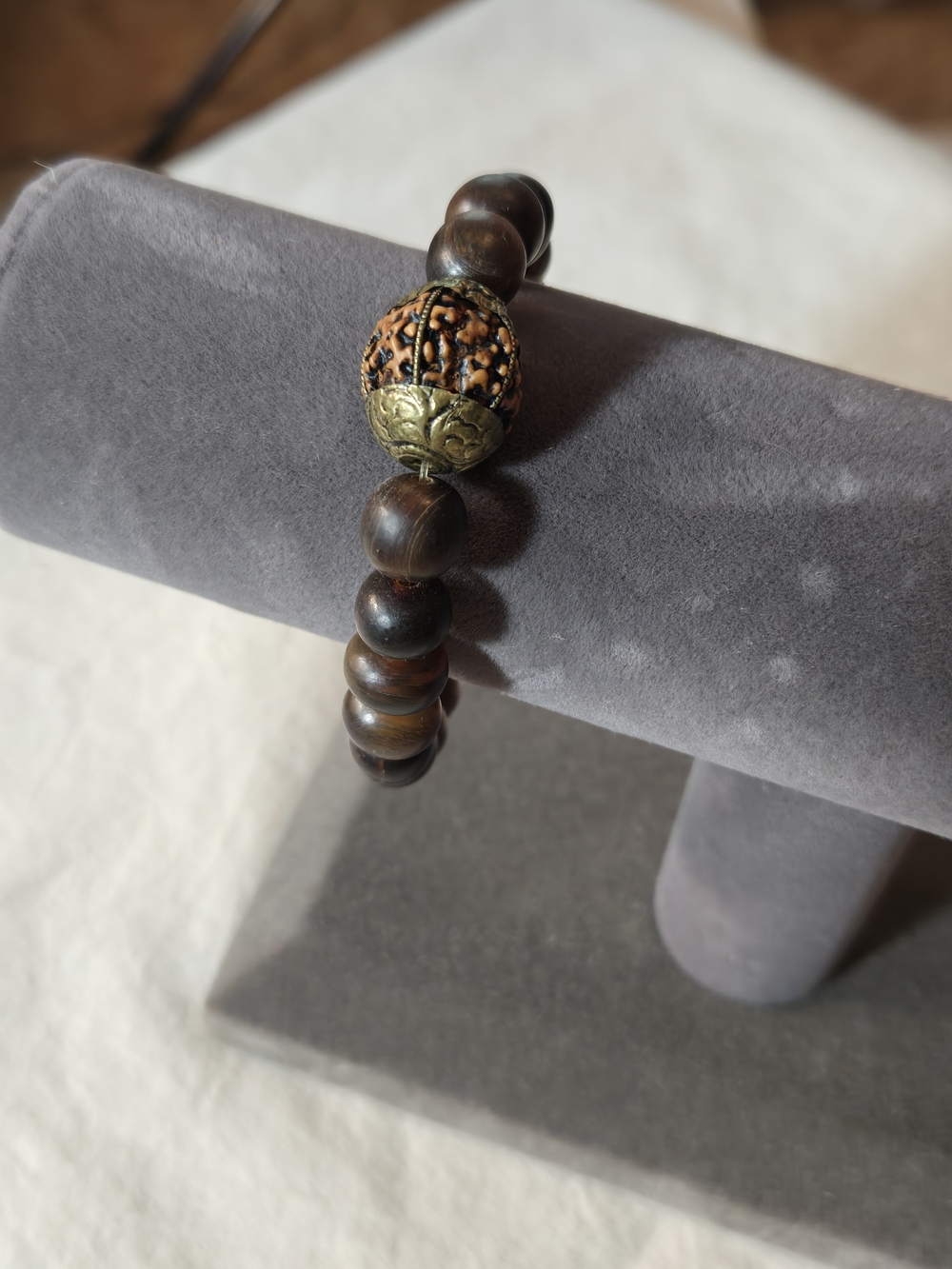 Handcrafted Brown Wood Bead Bracelet with Carved Accent